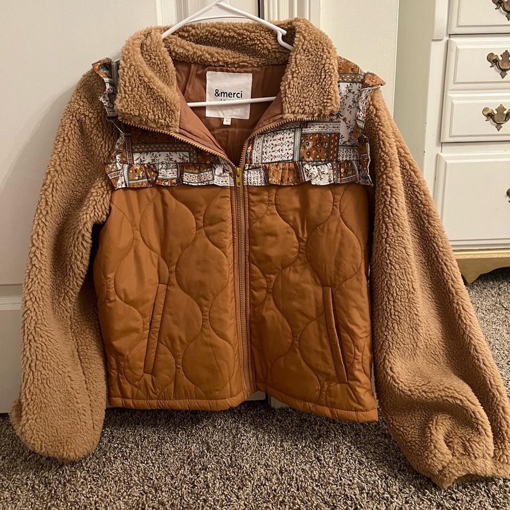 Never worn boutique jacket with pattern detailing! Size small